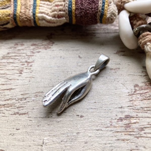 Vintage solid silver meditating pendant