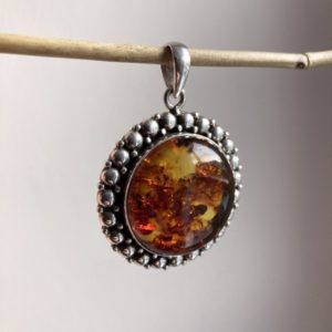 Vintage Indian solid silver amber pendant