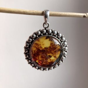 Vintage Indian solid silver amber pendant