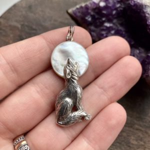 Vintage sterling silver mother of pearl wolf pendant