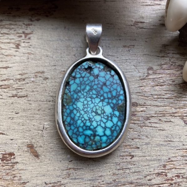 Vintage sterling silver spiderweb turquoise pendant