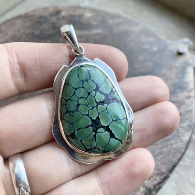 Vintage sterling silver green spiderweb turquoise pendant