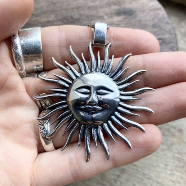 Vintage solid silver celestial sun necklace