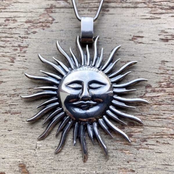 Vintage solid silver celestial sun necklace