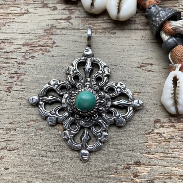 Vintage ornate sterling silver and turquoise pendant