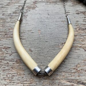 Vintage sterling silver and carved bone tusk necklace