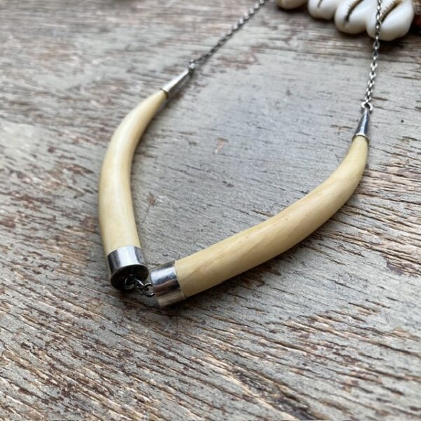 Vintage sterling silver and carved bone tusk necklace