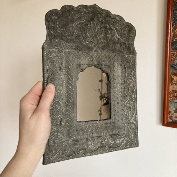 Vintage Indian embossed metal mirror