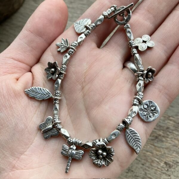 Solid silver hill tribe charm bracelet