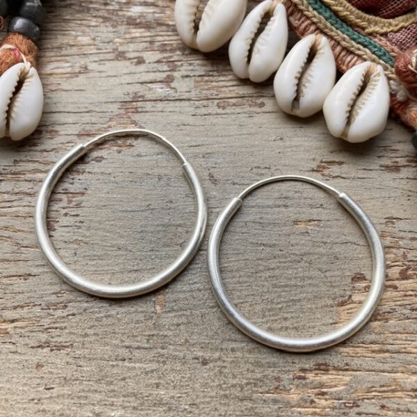 Simple pure silver hoops