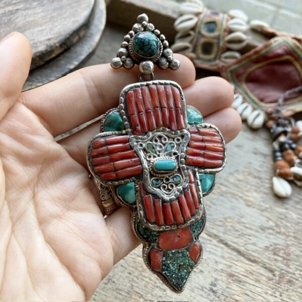 Vintage Tibetan sterling silver and red coral pendant