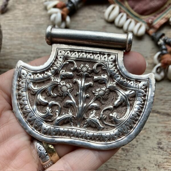 Vintage Indian sterling silver repousse pendant