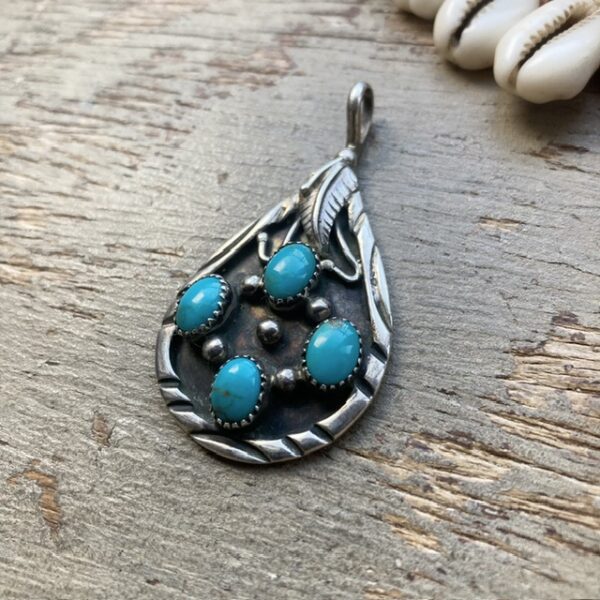 Vintage Navajo sterling silver and turquoise pendant