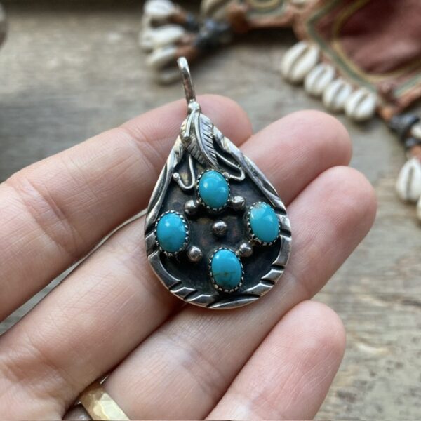 Vintage Navajo sterling silver and turquoise pendant