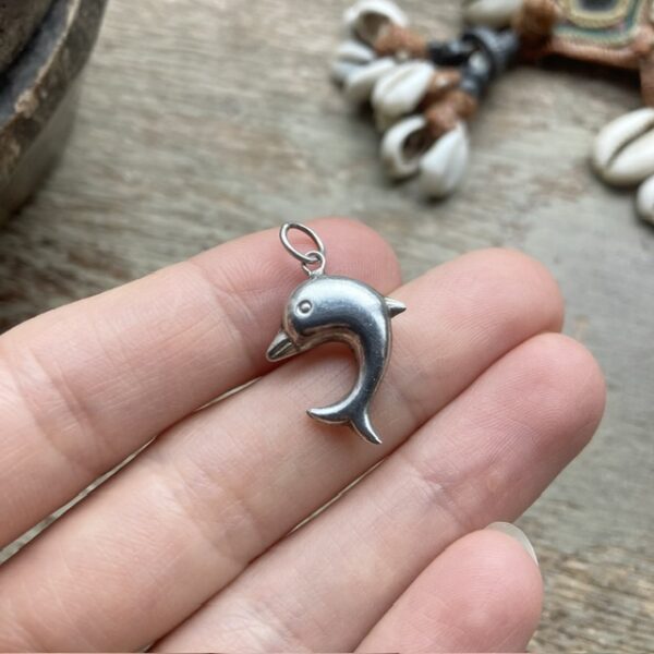 Vintage sterling silver dolphin pendant