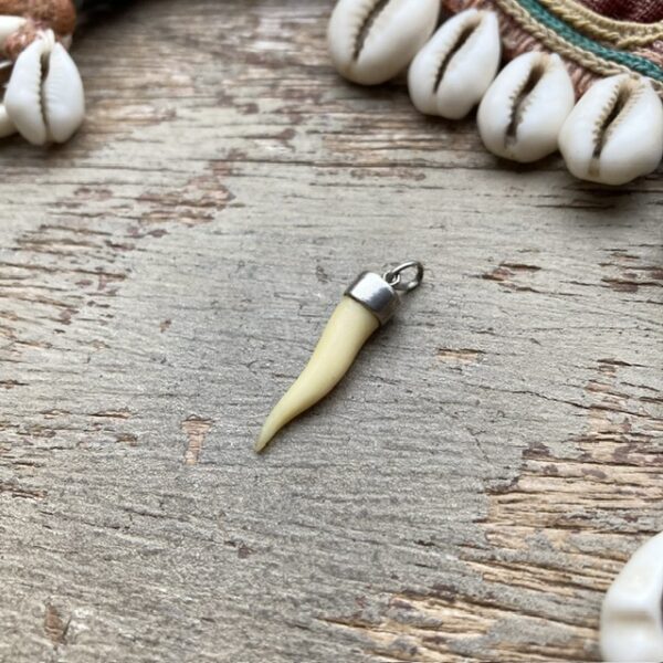 Vintage sterling silver carved bone pendant