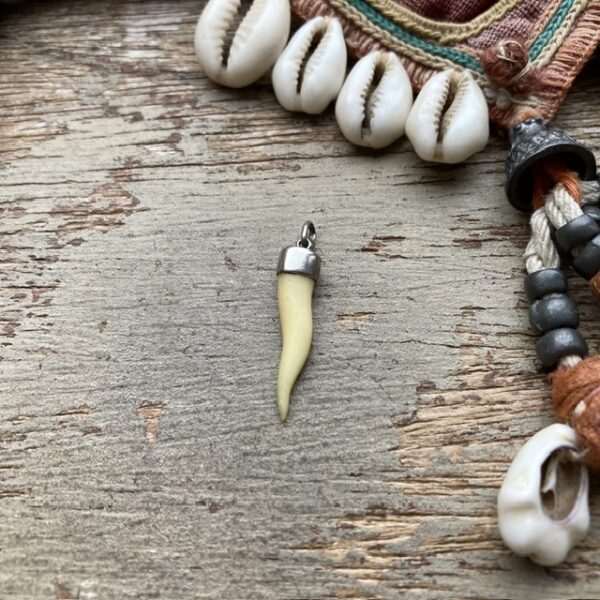 Vintage sterling silver carved bone pendant