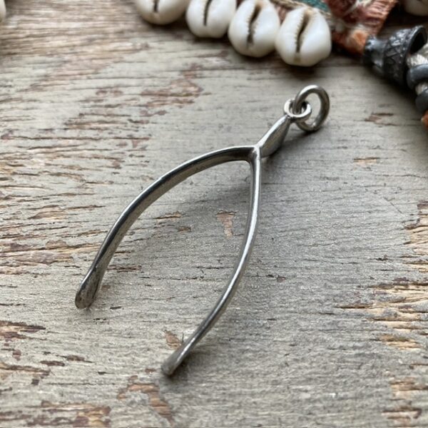 Vintage solid silver wishbone pendant