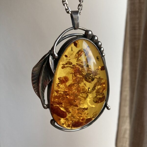 Vintage sterling silver and amber pendant