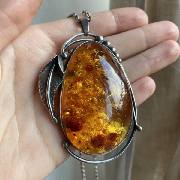 Vintage sterling silver and amber pendant