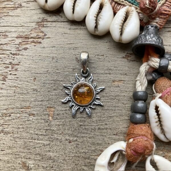 Vintage sterling silver sun pendant