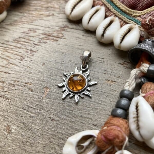 Vintage sterling silver sun pendant