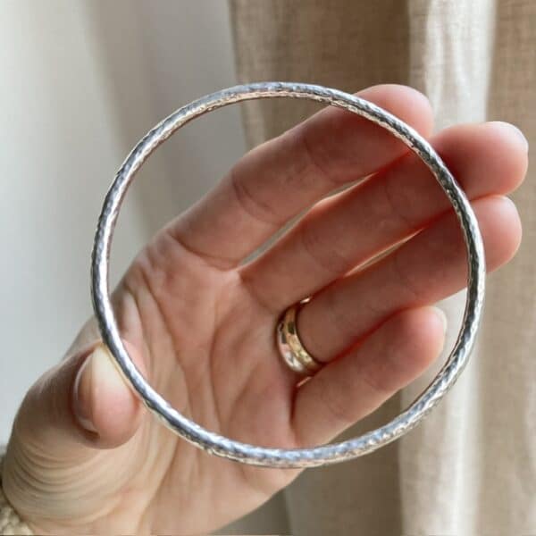 Vintage hammered solid silver bangle